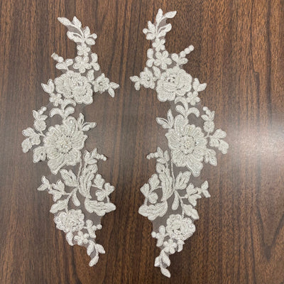 Beaded & Corded Floral Appliqué Lace Embroidered on 100% Polyester Organza or Net Mesh. This can be applied to Theatrical dance ballroom costumes, bridal dresses, bridal headbands endless possibilities.  Sold By Pair.  Lace Usa