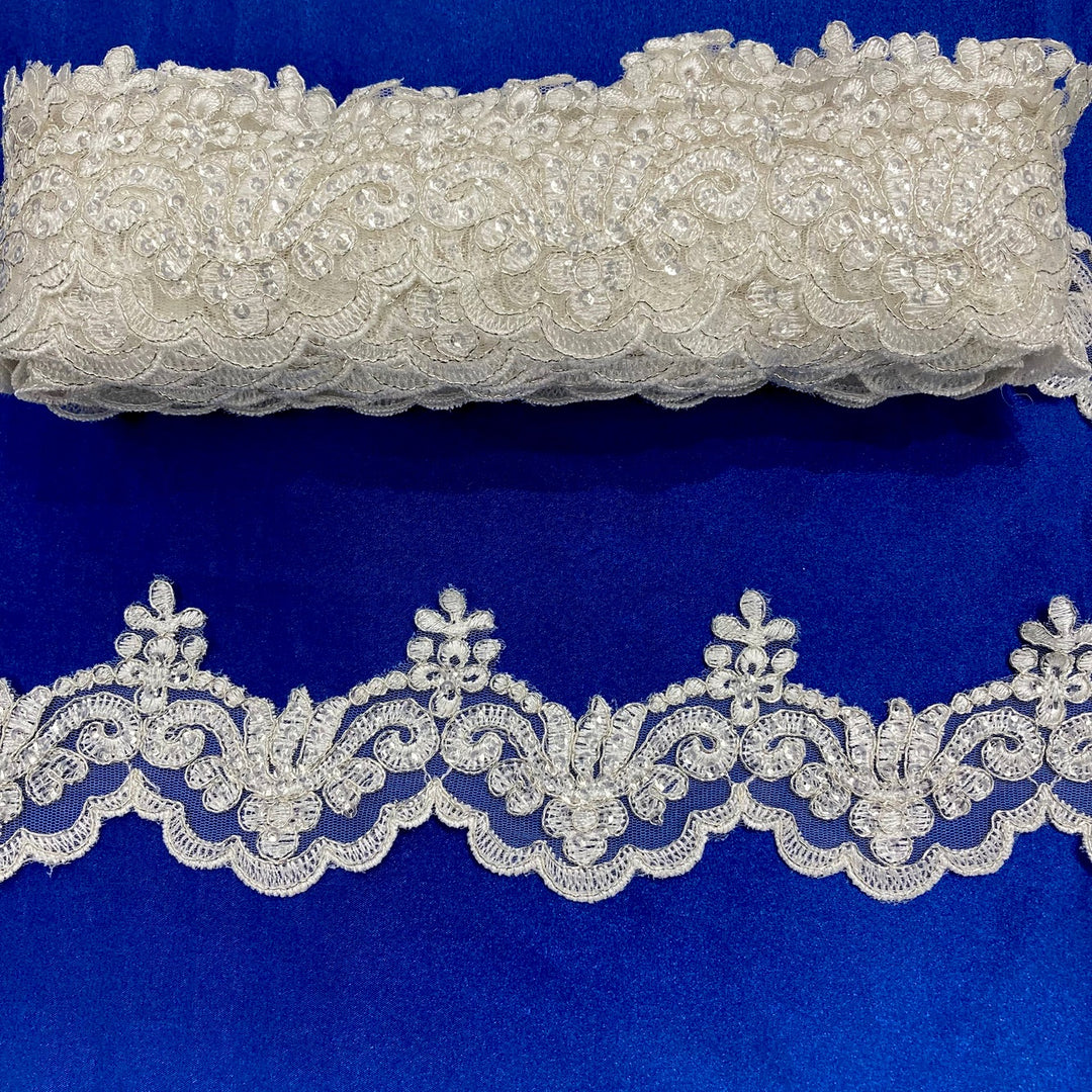 Corded, Beaded & Embroidered Ivory with Silver Trimming. Lace Usa