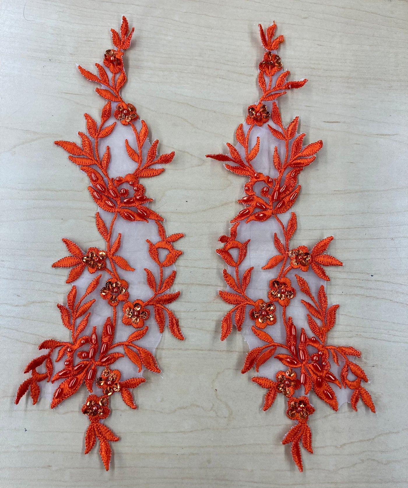 Orange Beaded Floral Applique Lace on 100% Polyester Organza Sold by the Pair. This can be allied to theatrical, dance, ballroom, costumes, bridal dresses, bridal headbands endless possibilities.  Lace Usa