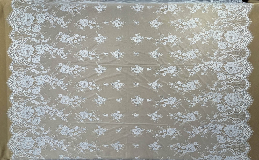 Ivory/Off White Chantilly lace fabric with floral patterns on a brown background - LaceUSA-GDF-11