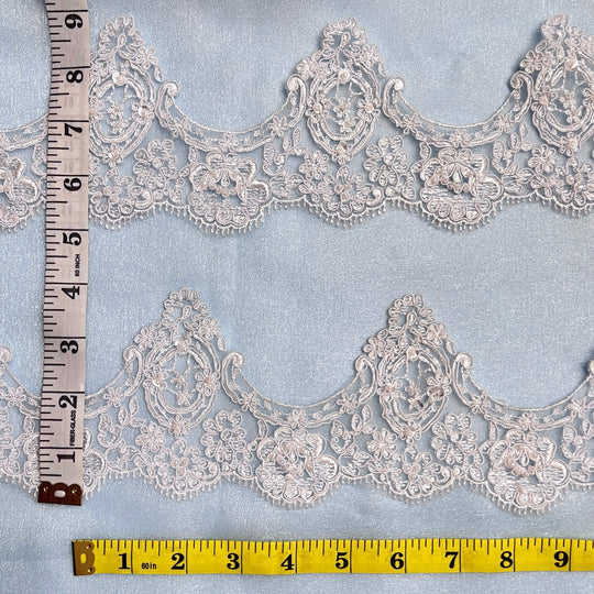 White beaded scalloped lace trim on mesh with two measuring tapes for size reference - Lace USA 96926WBP