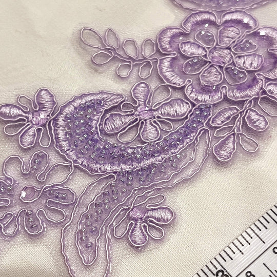 Closeup of Lilac Beaded & Corded Floral Lace Applique | Lace USA - KZ-67HB