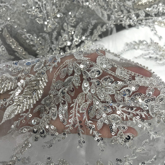 Close up of Silver beaded  and sequined vine and leaf lace on mesh  – great for  Bridal and Quincanera gowns and costume design  - LaceUSA GD-12695