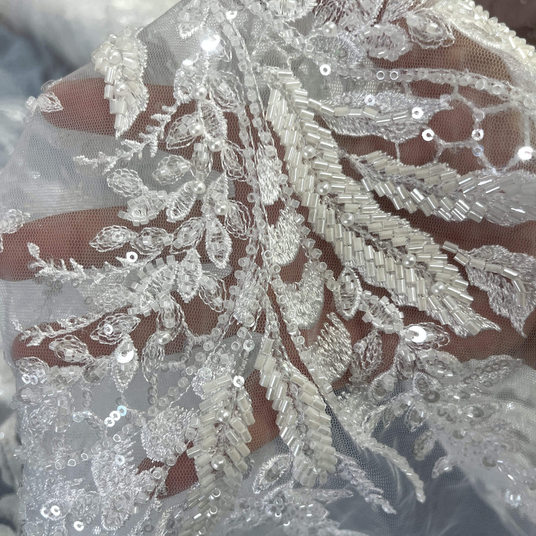Close up of Beaded vine and leaf lace in white with sequins and bugle beads on mesh – perfect for bridal gowns and Dance Costumes - LaceUSA_GD-12695