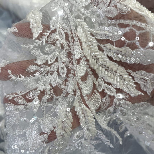 Close up of Beaded vine and leaf lace in white with sequins and bugle beads on mesh – perfect for bridal gowns and Dance Costumes - LaceUSA_GD-12695