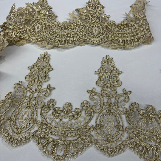 Two rows of 9-inch antique gold corded floral lace trim with ornate embroidery and scalloped edging on a white background, Lace USA 96794W.
