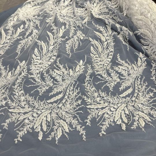 Partial view of Beaded vine and leaf lace in white with sequins and bugle beads on mesh – perfect for bridal gowns and Dance Costumes - LaceUSA_GD12695