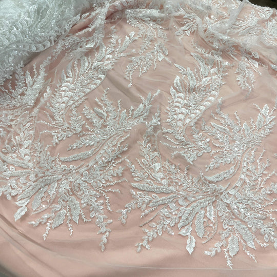Partial view of Beaded Off White lace fabric with embroidered leaf design, sequins, and beads – ideal for Bridal gowns and Dance Costumes - LaceUSA GD12695