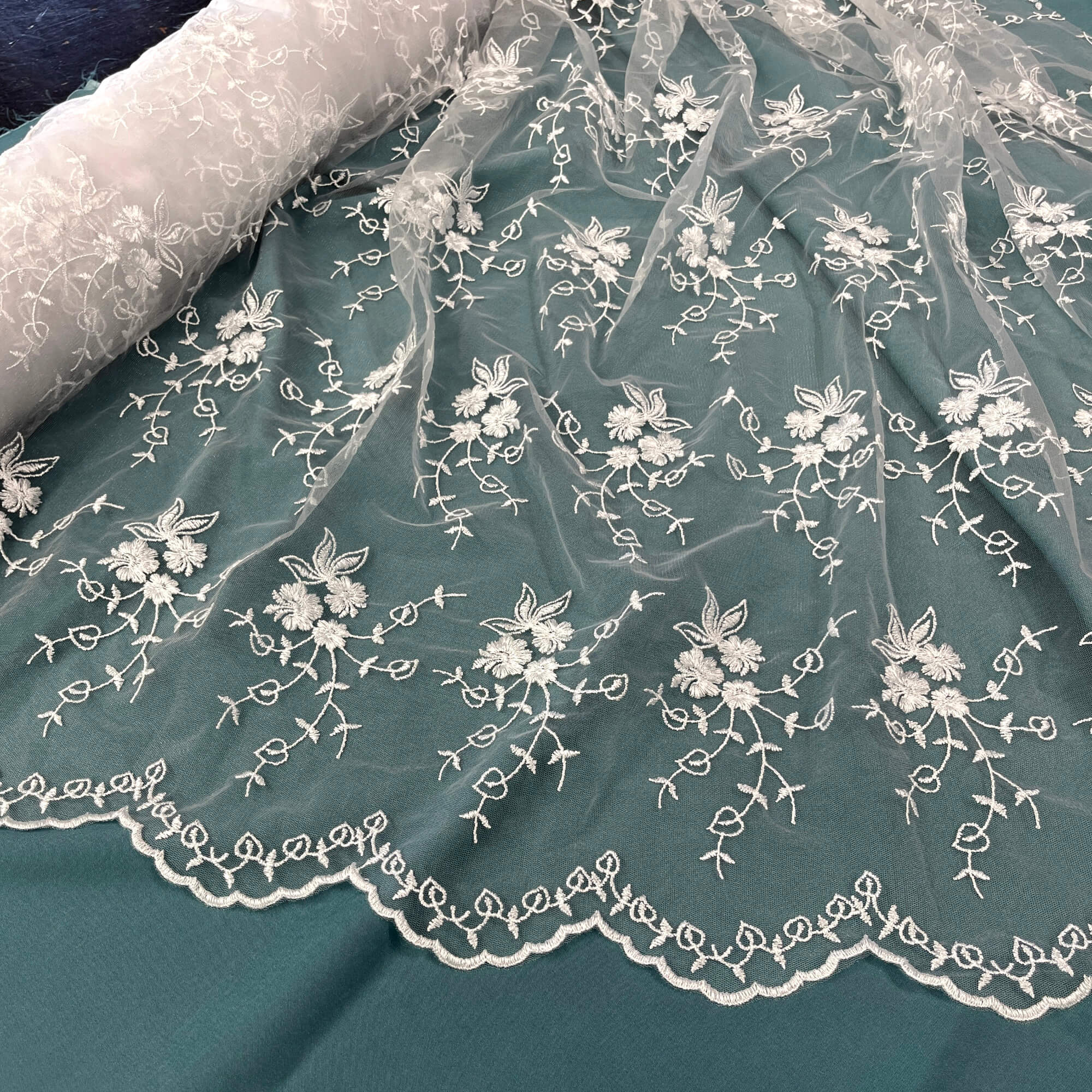 White Embroidered lace fabric with floral patterns on a teal background -LaceUSA30517W  
