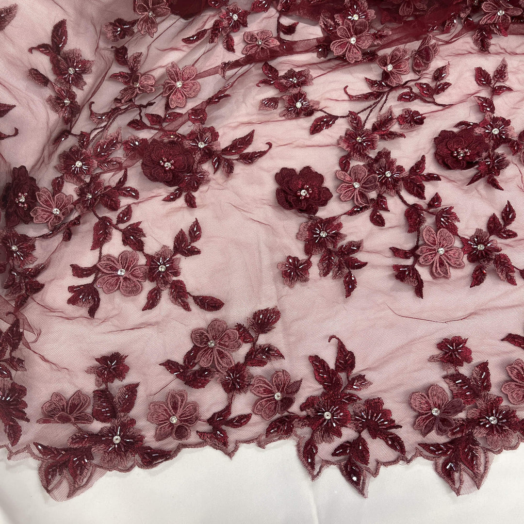 Section view of Lace USA GD-1613 3D wine floral lace with bead and rhinestone embellishments, featuring scalloped edging—ideal for gowns.
