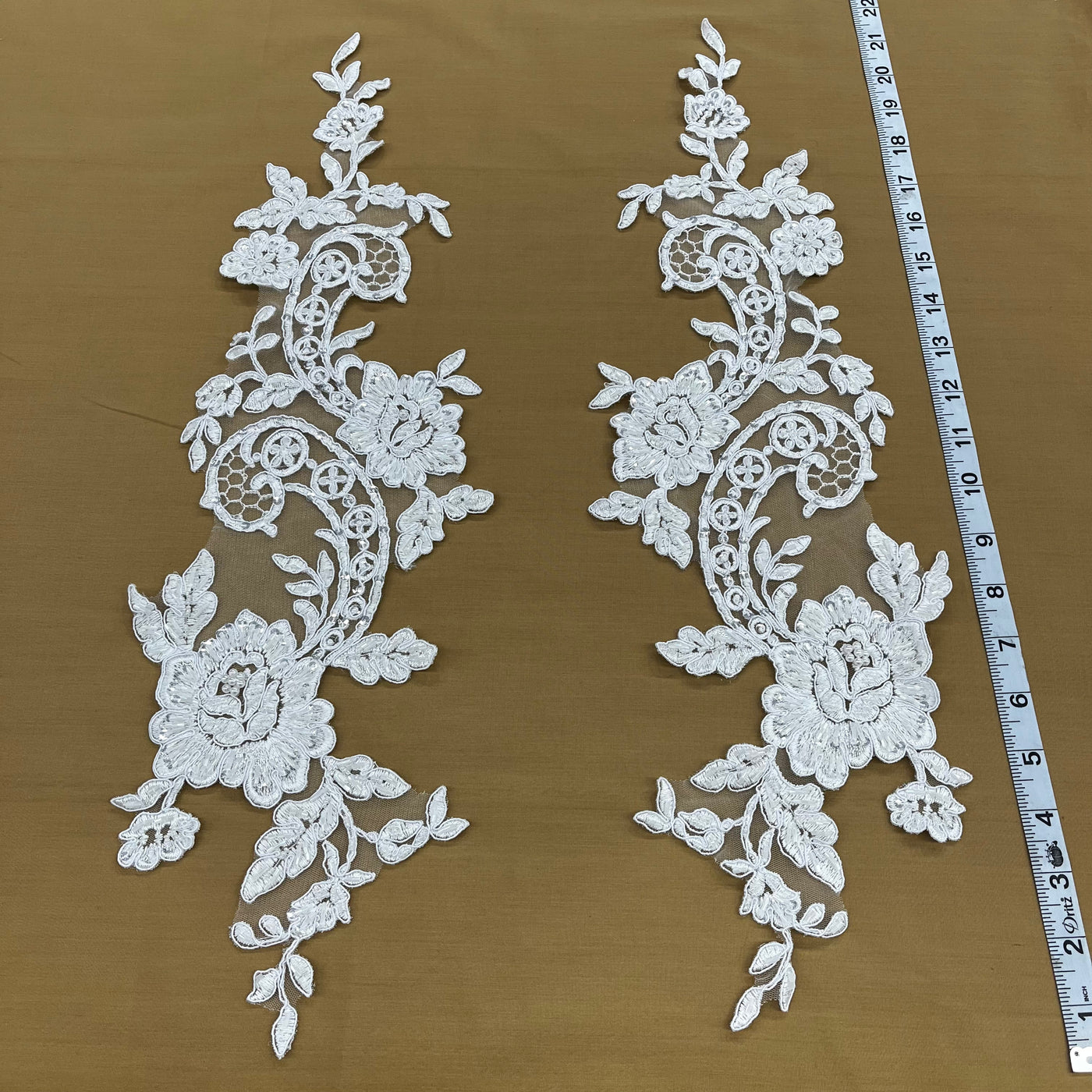 Beaded & Corded Floral Appliqué Lace Embroidered on 100% Polyester Organza or Net Mesh. This can be applied to Theatrical dance ballroom costumes, bridal dresses, bridal headbands endless possibilities. Sold By Pair Lace Usa