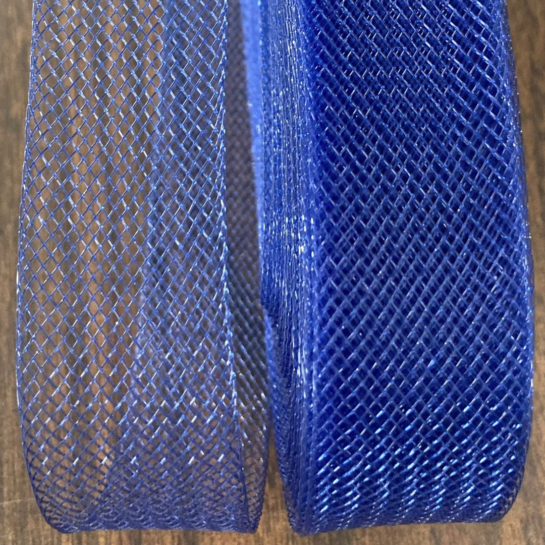 1-inch stiff crinoline horsehair braid trim made from 100% nylon for sewing hems, veils, and costumes. Royal Blue color.  Sold by the yard.  Lace USA