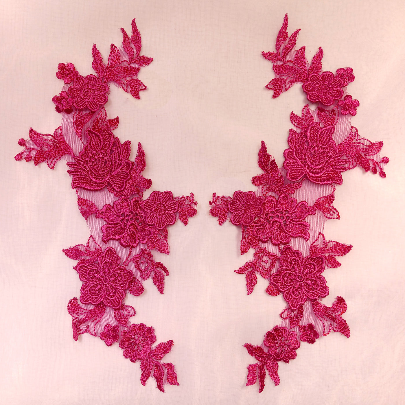 Embroidered Fuchsia Applique with 3D Flowers on 100% Polyester Net Mesh.
