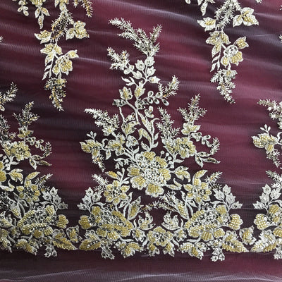 Embroidered & Heavily Beaded Fabric on net.  Sold by the yard.  Lace Usa