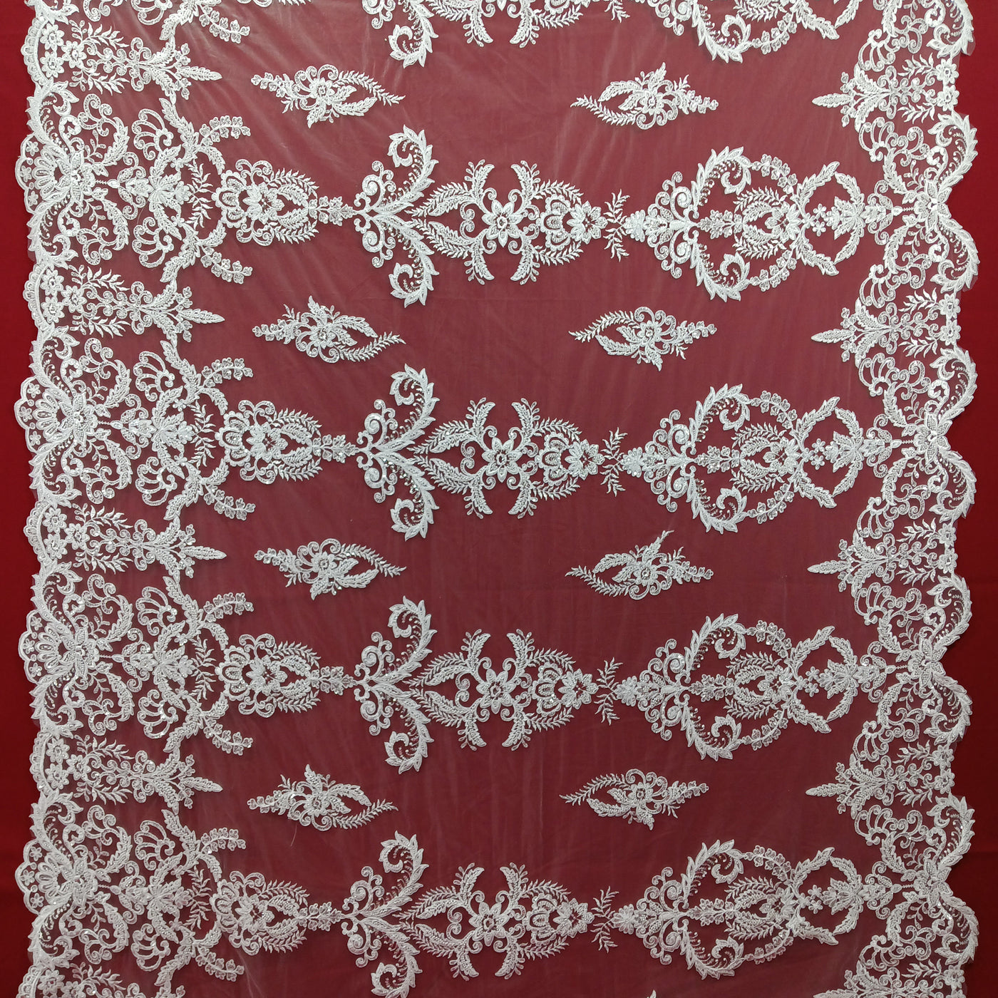 Corded & Beaded Bridal Lace Fabric Embroidered on 100% Polyester Net Mesh.  Sold the yard.  Lace Usa