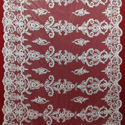 Corded & Beaded Bridal Lace Fabric Embroidered on 100% Polyester Net Mesh.  Sold the yard.  Lace Usa