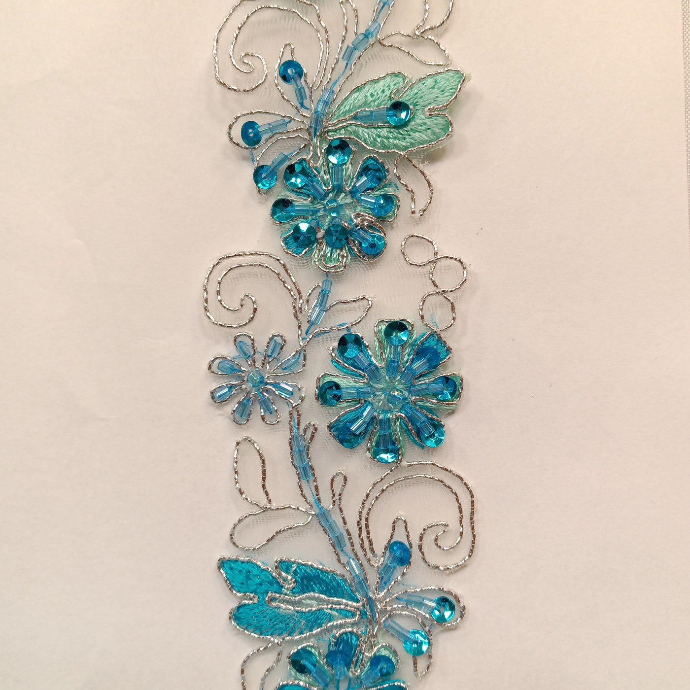 Beaded, Corded & Embroidered on Organza Turquoise with Silver Trimming. Lace Usa