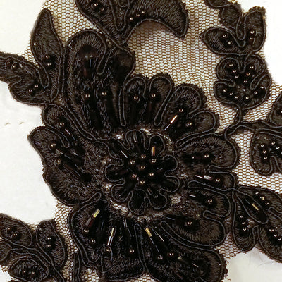 Beaded & Corded Black Floral Appliqué Lace Embroidered on 100% Polyester Organza or Net Mesh. This can be applied to Theatrical dance ballroom costumes, bridal dresses, bridal headbands endless possibilities.  Sold By Pair.  Lace Usa