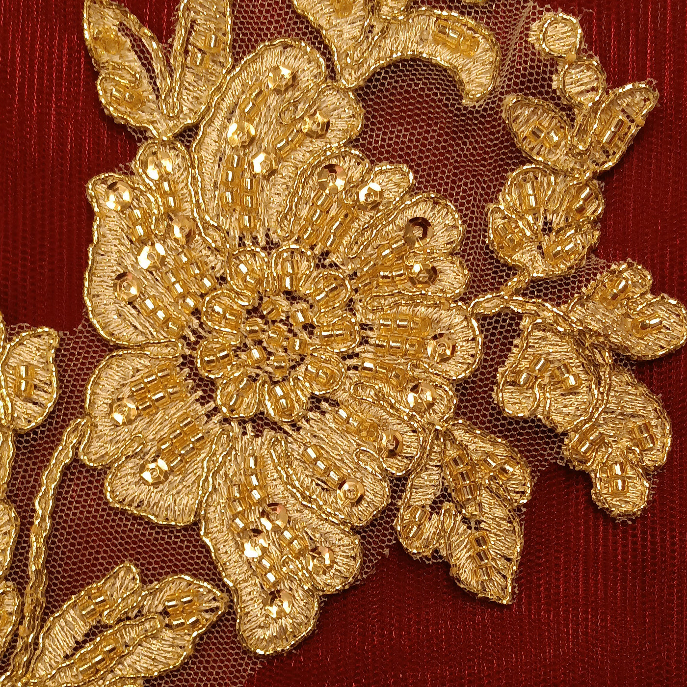 Beaded & Corded Gold Floral Appliqué Lace Embroidered on 100% Polyester Organza or Net Mesh. This can be applied to Theatrical dance ballroom costumes, bridal dresses, bridal headbands endless possibilities.  Sold By Pair.  Lace Usa