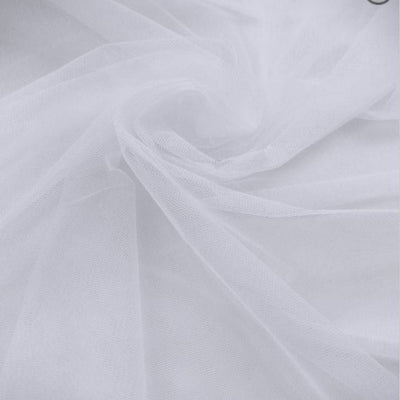 Illusion, Tulle/Net 108 inches wide, soft, 100% polyester.  This tulle is used for wedding veils. This tulle gathers together tightly for a nice, full look on a veil.    Ivory,    Diamond White,     White,     Blush  This can also be used for flower girl’s skirts, on the skirt of a wedding gown for a full skirt with volume, for wedding decorations, for table decorations, decorating packages, or tying large bows. Sold by the yard. Lace Usa