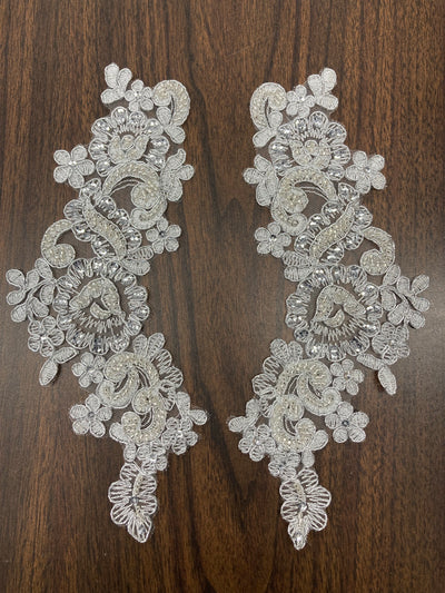 Beaded & Corded Floral Appliqué Lace Embroidered on 100% Polyester Organza or Net Mesh. This can be applied to Theatrical dance ballroom costumes, bridal dresses, bridal headbands endless possibilities.  Sold By Pair.  Lace Usa  Sold in a set of 2.