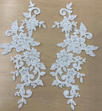 Beaded & Corded White Floral Appliqué Lace Embroidered on 100% Polyester Organza or Net Mesh. This can be applied to Theatrical dance ballroom costumes, bridal dresses, bridal headbands endless possibilities.  Sold By Pair.  Lace Usa