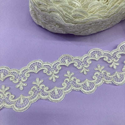 Corded & Embroidered Double Sided Ivory with Silver Trimming on Mesh Net Lace. Lace USA