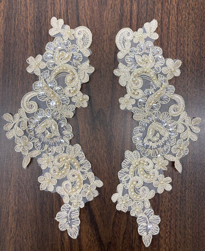 Beaded & Corded Floral Appliqué Lace Embroidered on 100% Polyester Organza or Net Mesh. This can be applied to Theatrical dance ballroom costumes, bridal dresses, bridal headbands endless possibilities.  Sold By Pair.  Lace Usa  Sold in a set of 2.