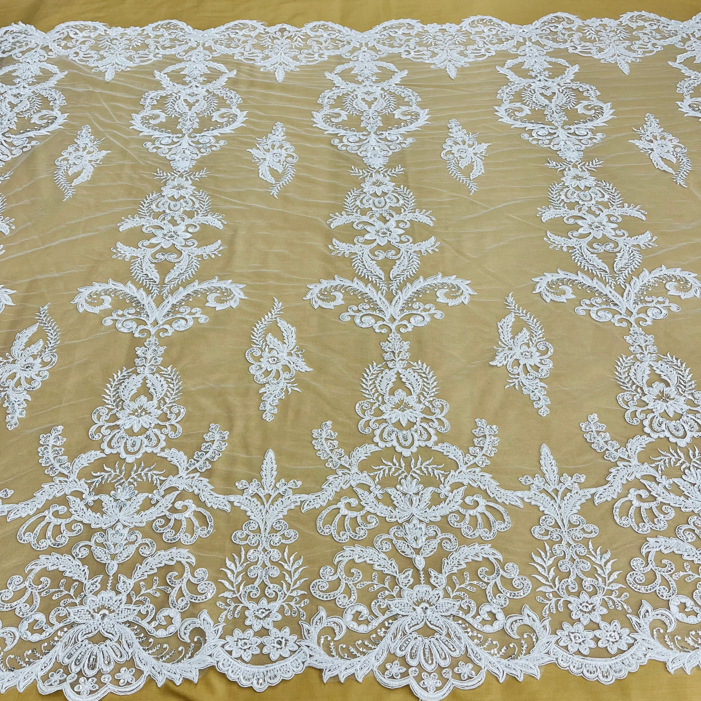 Corded & Beaded Bridal Lace Fabric Embroidered on 100% Polyester Net Mesh. Sold the yard. Lace Usa