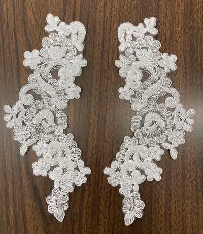 Beaded & Corded Floral Appliqué Lace Embroidered on 100% Polyester Organza or Net Mesh. This can be applied to Theatrical dance ballroom costumes, bridal dresses, bridal headbands endless possibilities.  Sold By Pair.  Lace Usa  Sold in a set of 2.