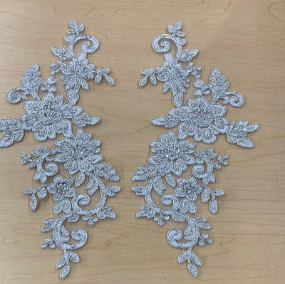 Beaded & Corded Silver Floral Appliqué Lace Embroidered on 100% Polyester Organza or Net Mesh. This can be applied to Theatrical dance ballroom costumes, bridal dresses, bridal headbands endless possibilities.  Sold By Pair.  Lace Usa