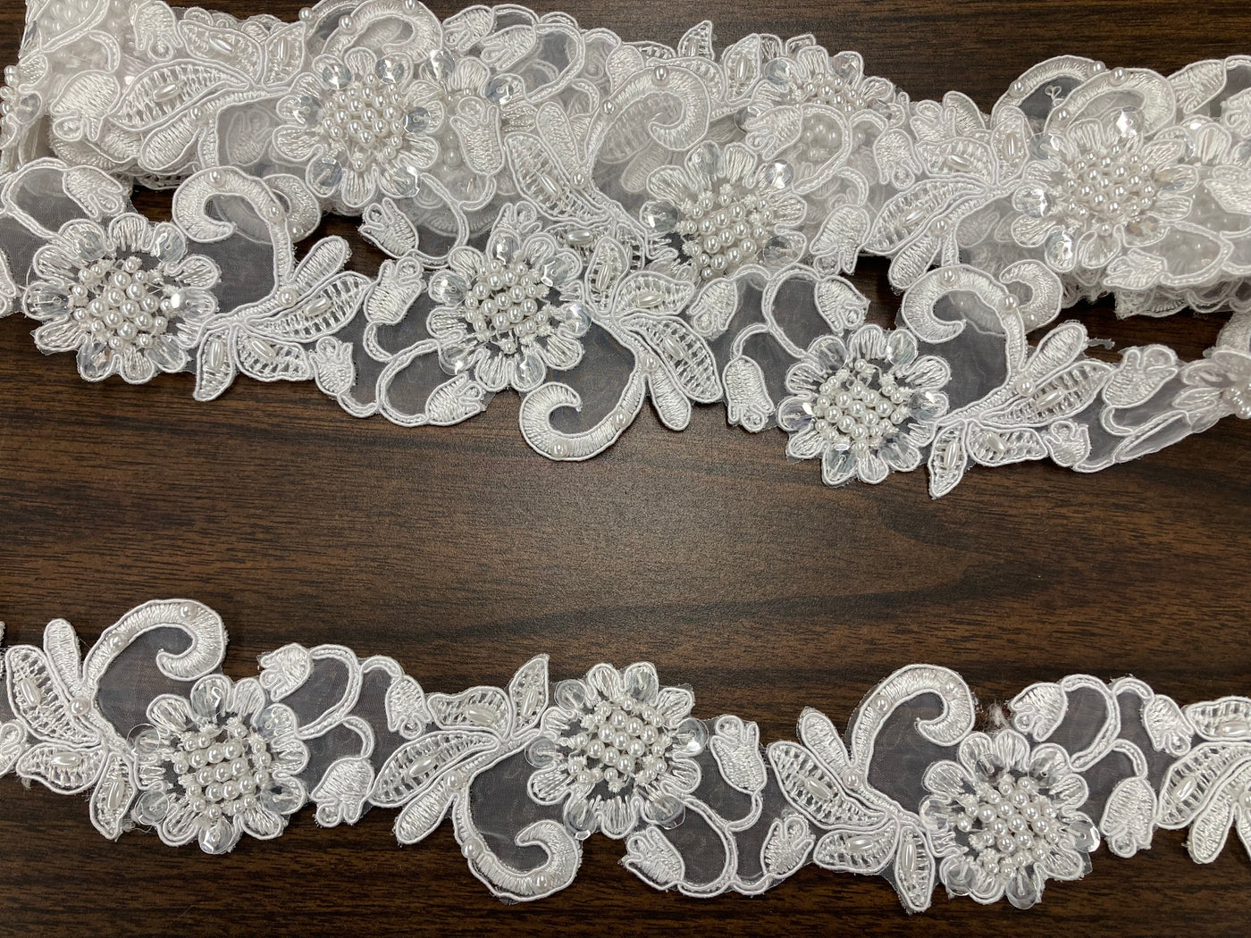 Corded & Beaded Embroidered Trimming on 100% Polyester Organza or Mesh Net Lace.  Sold by the yard.  Lace Usa