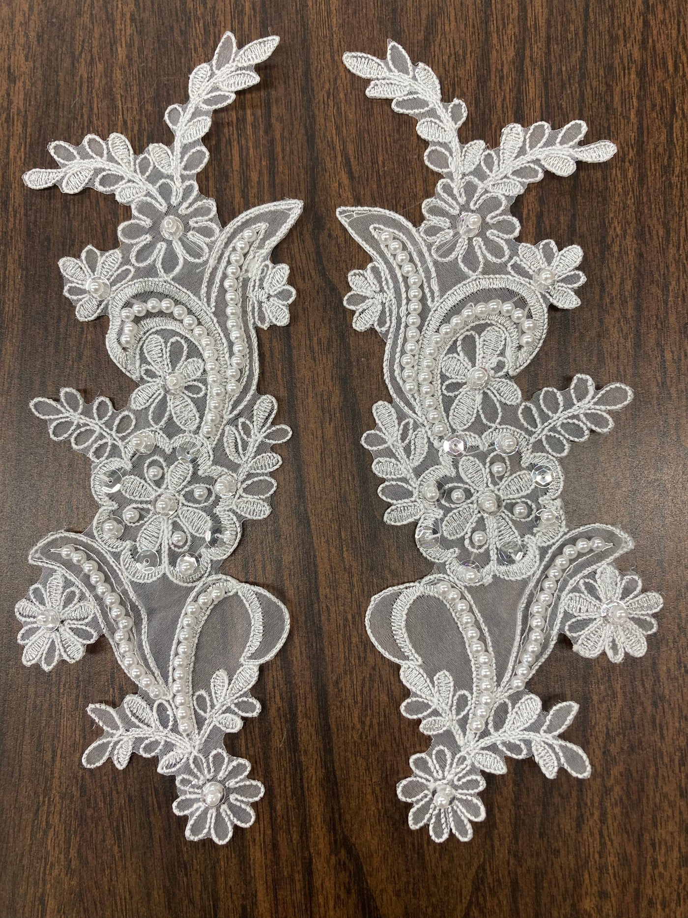 Beaded & Corded Floral Appliqué Lace Embroidered on 100% Polyester Organza or Net Mesh. This can be applied to Theatrical dance ballroom costumes, bridal dresses, bridal headbands endless possibilities.  Sold By Pair  Lace Usa