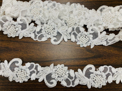 Corded & Beaded Embroidered Trimming on 100% Polyester Organza or Mesh Net Lace.  Sold by the yard.  Lace Usa