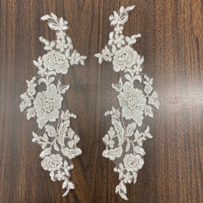 Beaded & Corded Floral Appliqué Lace Embroidered on 100% Polyester Organza or Net Mesh. This can be applied to Theatrical dance ballroom costumes, bridal dresses, bridal headbands endless possibilities.  Sold By Pair.  Lace Usa