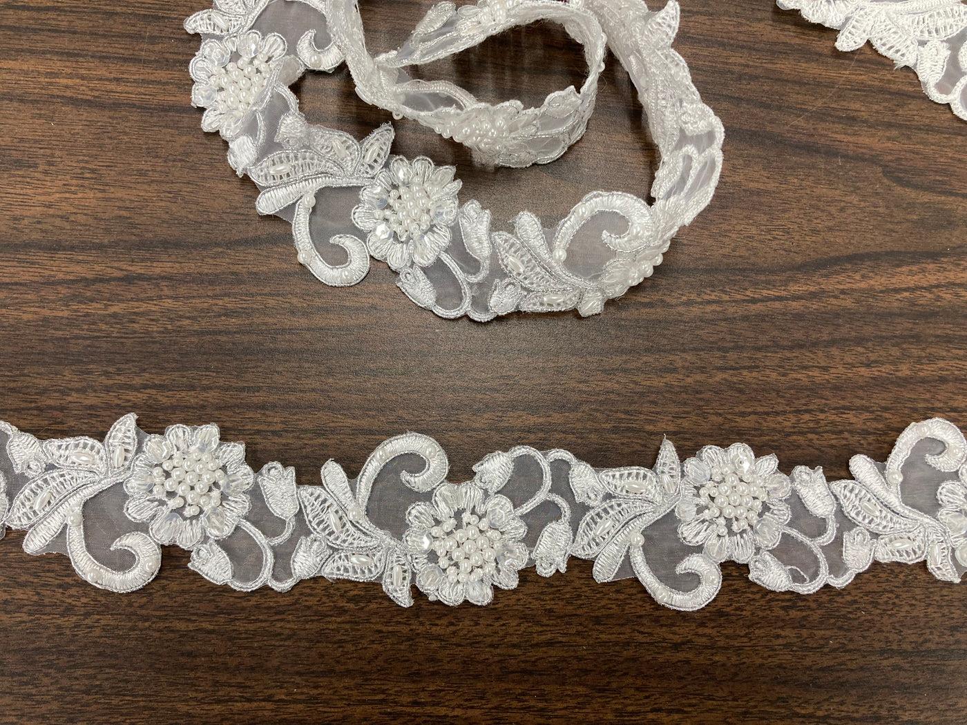 Corded & Beaded Embroidered Trimming on 100% Polyester Organza or Mesh Net Lace.  Sold by the yard.  Lace Usa