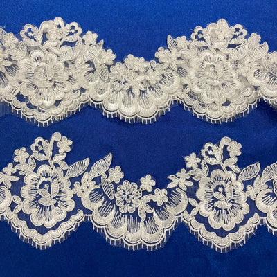 Corded Ivory Trimming Embroidered on 100% Polyester Net Mesh. Lace Usa