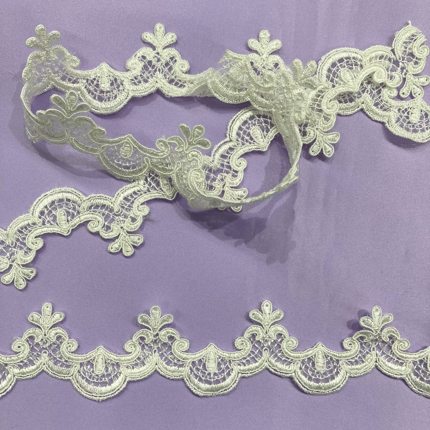 Corded Ivory Lace Trimming Embroidered on 100% Polyester Net Mesh. Lace USA
