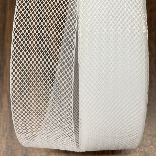 1-inch wide white 
 horsehair trim for bridal veils, ruffles, and structured hems.  Sold by the yard.  Lace USA