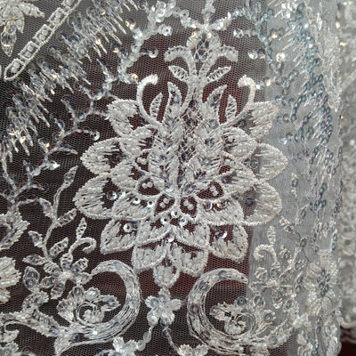 Embroidered & Heavily Beaded with Beads & sequin on Net Mesh Fabric.  Sold by the yard.  Lace Usa